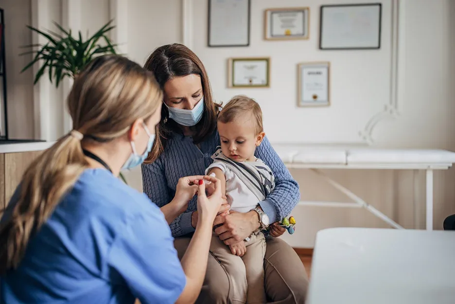 a baby had immunization inside a clinic