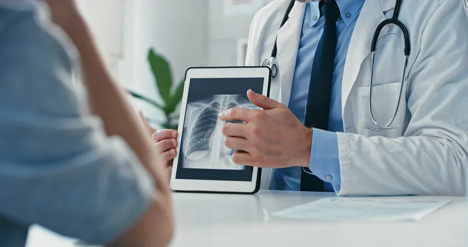a doctor shares information about the patient's condition during consultation