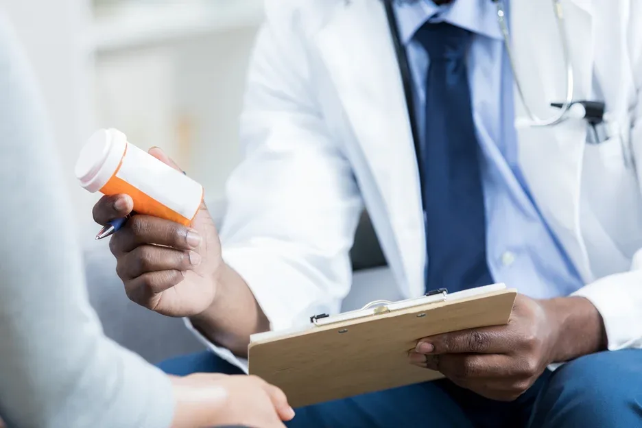 doctor instructed his patient about medication dosage