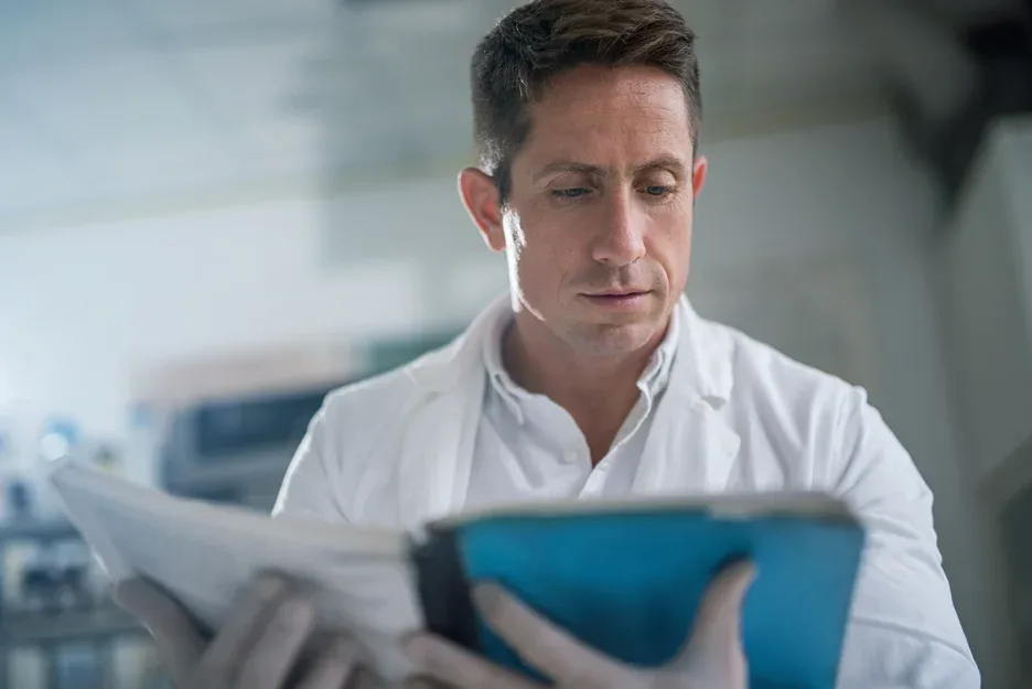 doctor analyzes patient's data from tests
