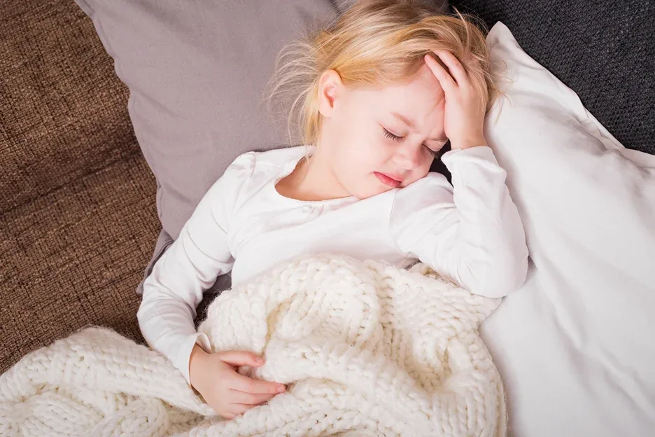 child is sick, having headache