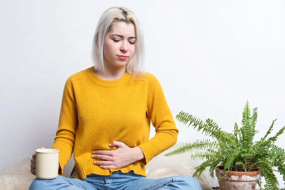 a woman has abdominal pain