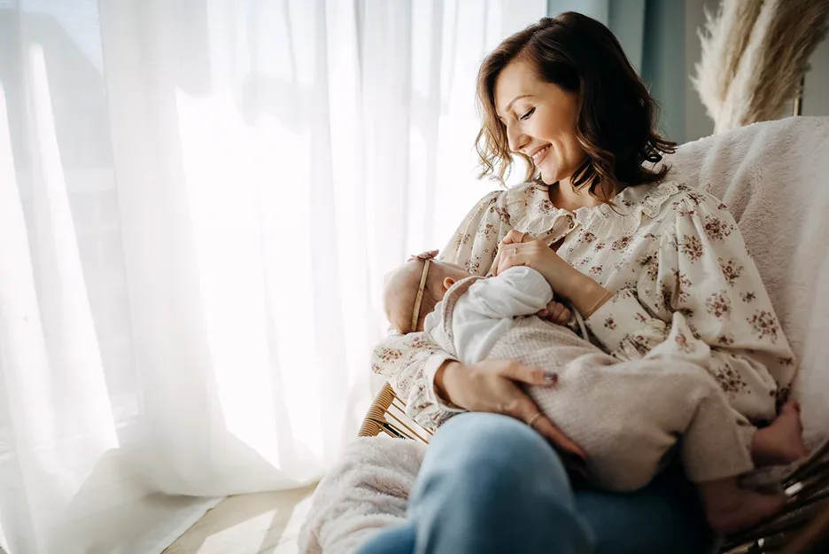 mother breastfeeding her baby