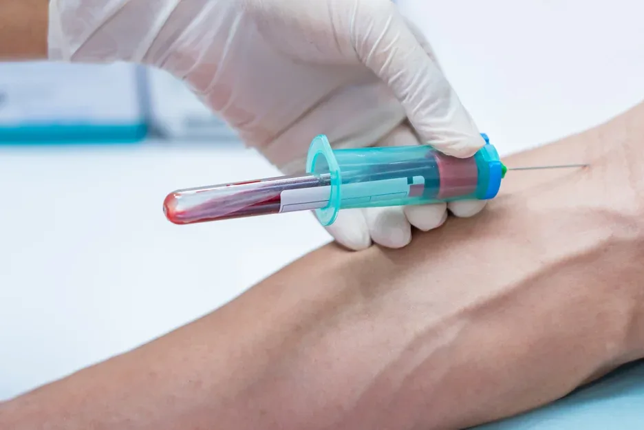 a nurse getting blood sample from the patient for a blood test