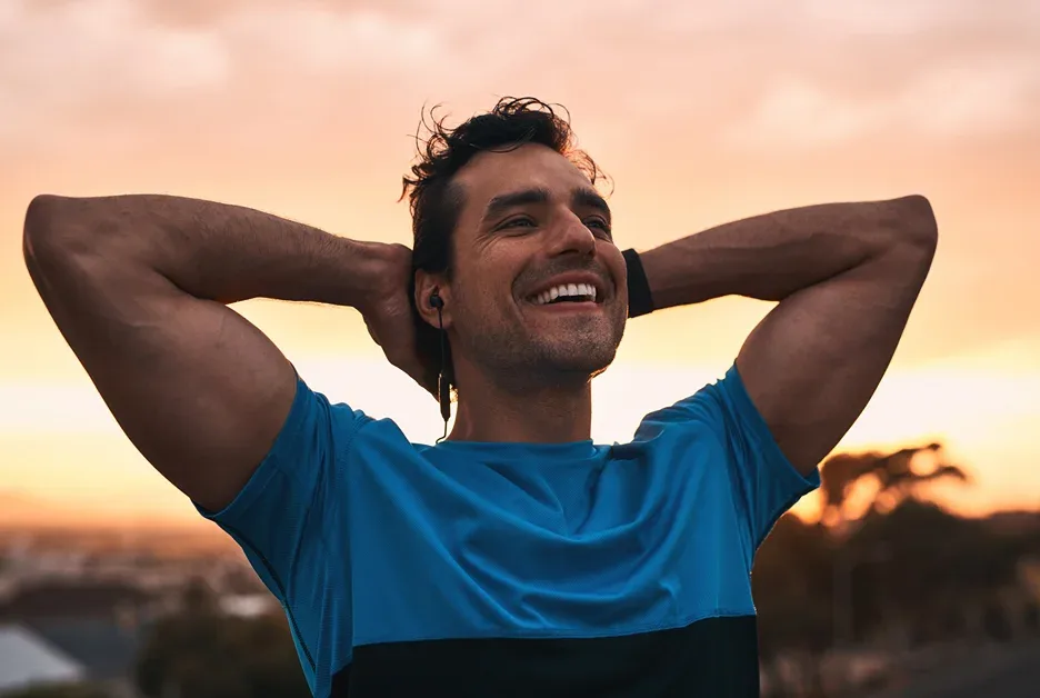 a man relaxes after a run