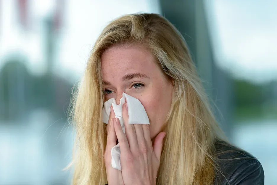 a woman has allergy
