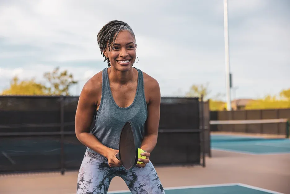 a woman is playing tennis
