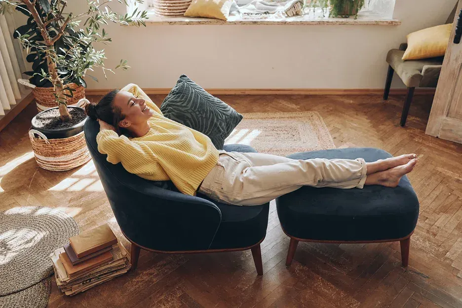 a woman relaxing on the couch