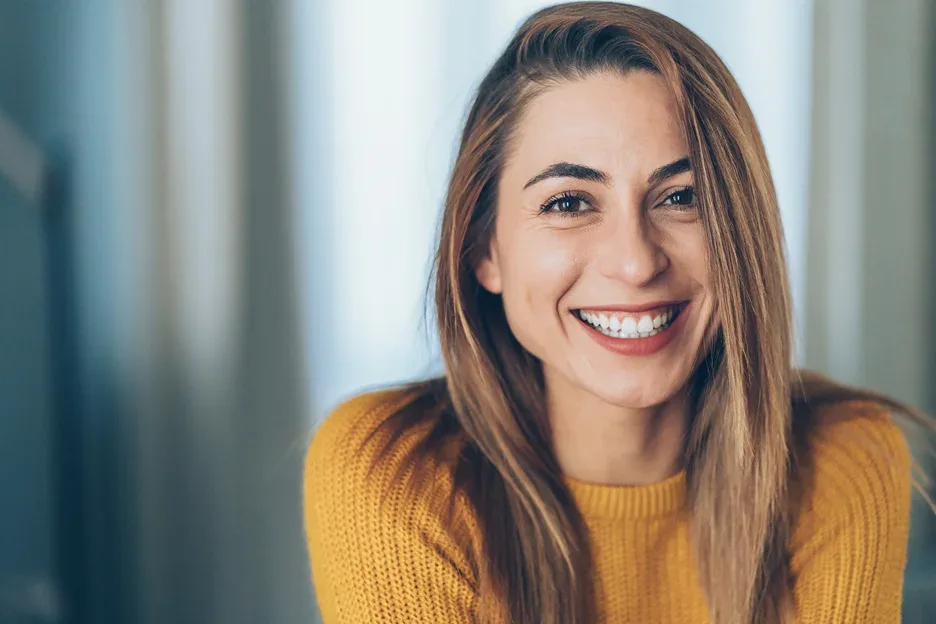 a pretty, smiling woman