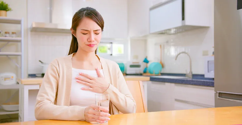 a woman has acid reflux condition