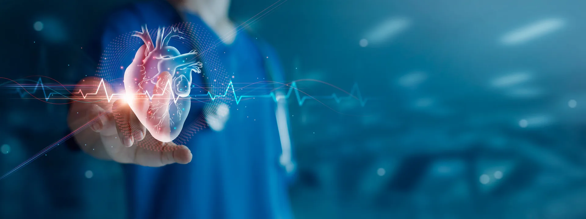 Clinician holding a glowing digital heart graphic with a heartbeat line